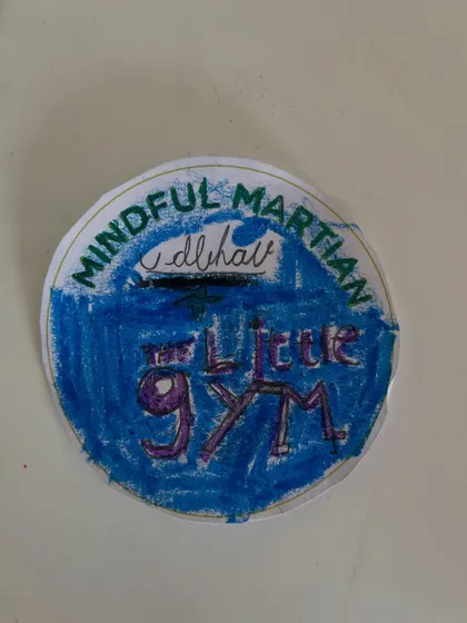 Look at this colorful "Mindful Martian" badge! Art and craft time allows kids to express themselves and take home a tangible reminder of their achievements.