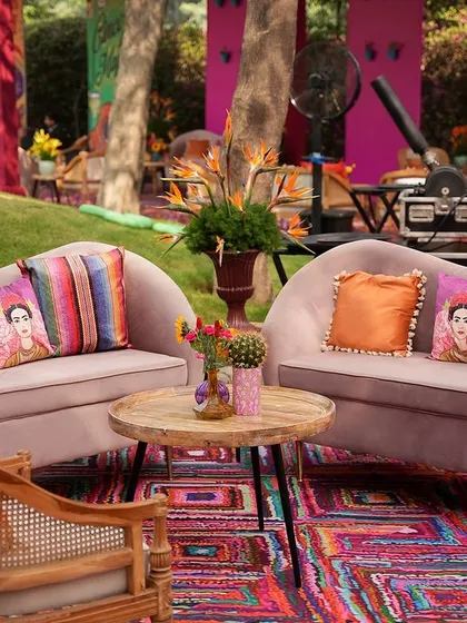 Another view of the comfortable lounge seating, with the colorful cushions adding personality and flair.