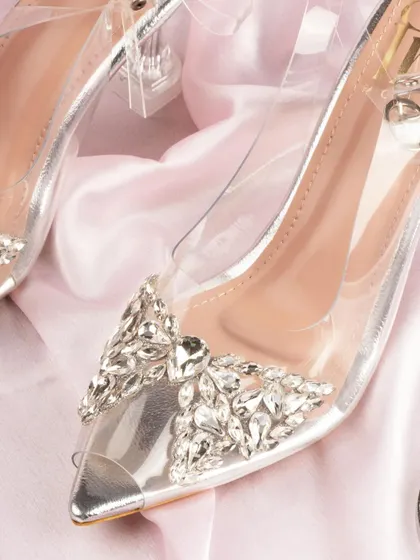 A detailed macro shot of the crystal embellishments on a pair of Fancy Nancy heels. This close-up highlights the craftsmanship and luxurious details of the footwear.