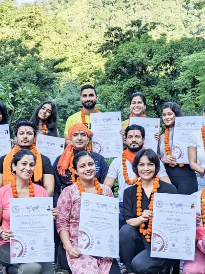 A proud moment for our graduates, holding their hard-earned certificates after completing the rigorous 300-hour YTTC.