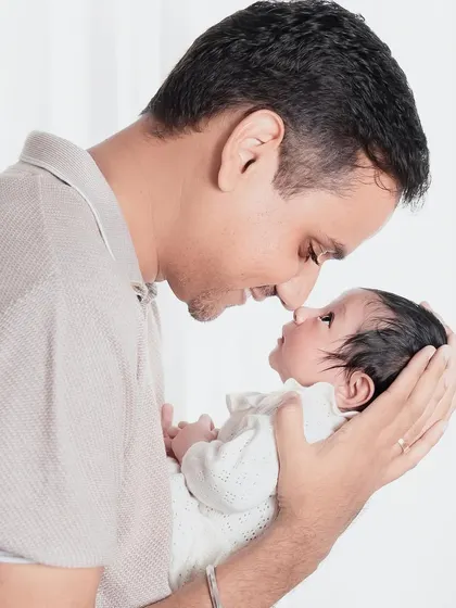 The look of pure love between a father and his newborn. These are the quiet, powerful moments I strive to capture in every session.