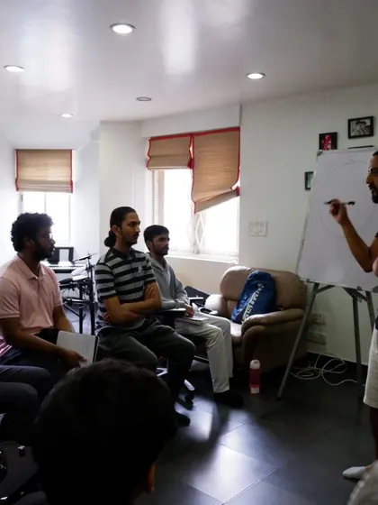More from our music theory class, where students learn about sound, rhythm, and composition.
