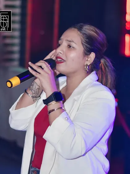 This guest is delivering a powerful performance at one of our weekly karaoke nights. I love seeing people discover their inner performer.
