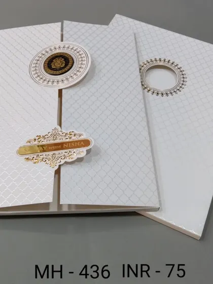 This modern white invitation has a textured pattern and a gate-fold opening. The gold emblems add a touch of elegance to the minimalist design.