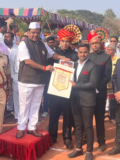 Our senior fencer receiving the District Best Player award from a local dignitary. This award recognizes his outstanding contribution and performance in the sport.