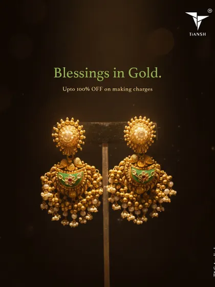 Blessings in Gold. These traditional gold jhumkas with green meenakari work and clusters of pearls are crafted to hold meaning, stories, and grace for all your festive moments.