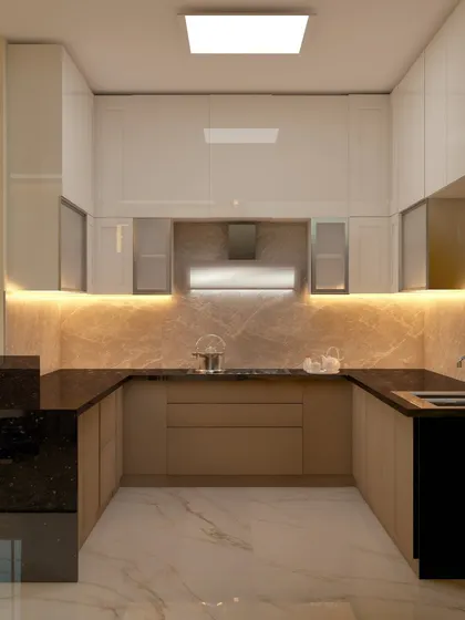 A luxurious U-shaped kitchen with granite countertops and high-gloss cabinets. The design incorporates warm ambient lighting under the upper cabinets to illuminate the workspace and create a sophisticated mood.