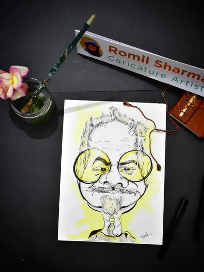 A caricature of actor Sanjay Mishra on my desk, a piece I created to honor his incredible talent.