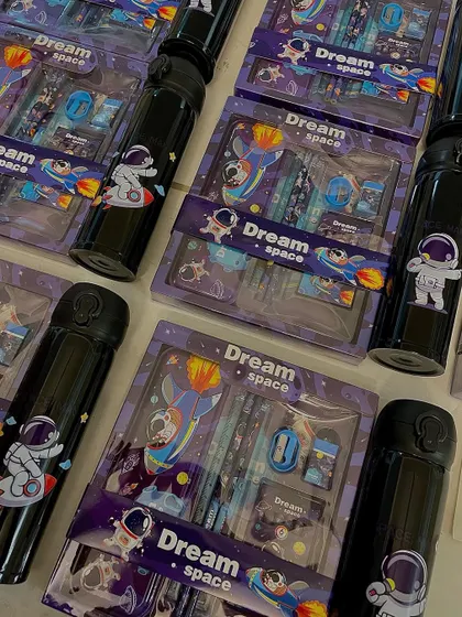 A closer look at the "Dream Space" stationery sets, a popular choice for boys' birthday party return gifts.