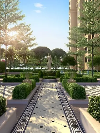 A formal garden with a classical statue, geometric hedges, and a patterned walkway, creating a space of refined elegance and order.