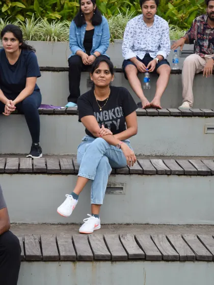 Team members relaxing on the amphitheater steps during a break. I design offsites with plenty of downtime for informal chats and personal reflection.