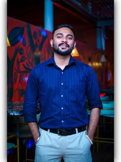 A full-body shot showing off a formal look. I can adapt my style for any event, from casual club nights to formal corporate functions.