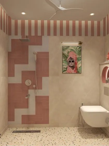 The shower area is designed with a fun geometric pattern using pink subway tiles, adding a playful touch to the space.