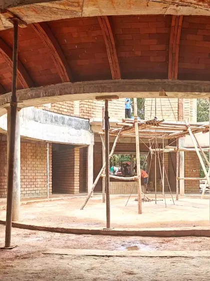 A brick vault under construction. This image captures the raw beauty of the building process, showing the structural logic and inherent texture of arched masonry before the final finishes are applied.