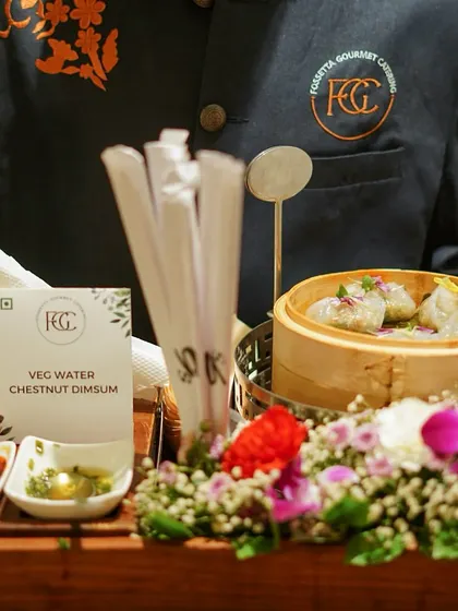 Our Veg Water Chestnut Dim Sum is a delicate and flavorful vegetarian option. Served in a traditional bamboo steamer basket with dipping sauces, it brings an authentic touch of Asian cuisine to your event.