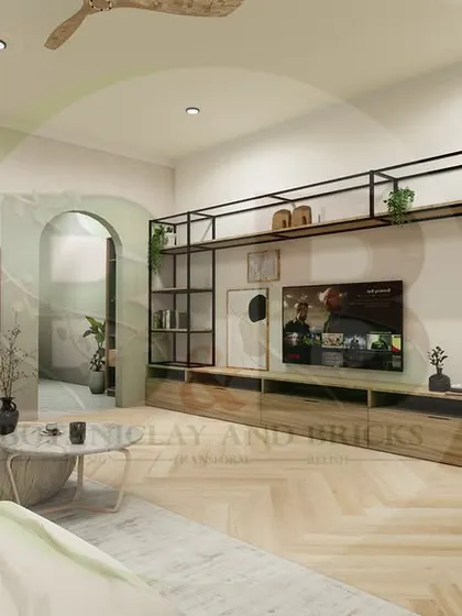 Another perspective of the living room, highlighting the interplay of textures and natural elements. The arched doorways add a soft, architectural detail that enhances the room's unique character.