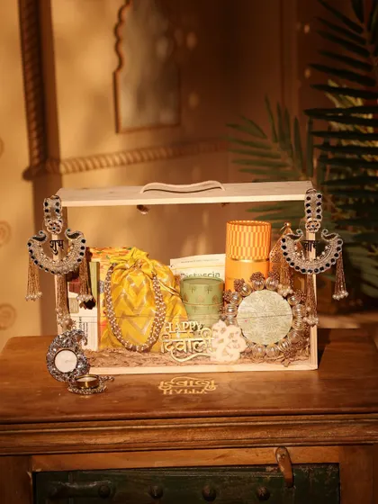 Another view of the yellow-themed wooden crate hamper, showing the arrangement of all the festive goodies inside.