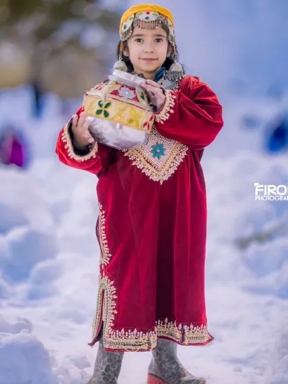 Another portrait of my daughter in a beautiful red Kashmiri Pheran. These personal photos are treasures, and I bring that same passion to capturing your family's memories.