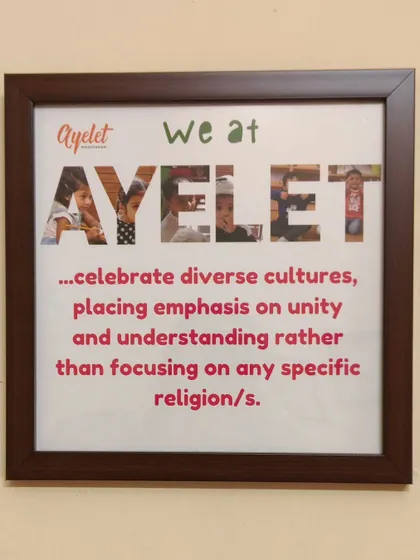 This frame in our school captures a core value. We celebrate diverse cultures, placing emphasis on unity and understanding rather than focusing on any specific religion. We believe in creating an environment of love and equality.