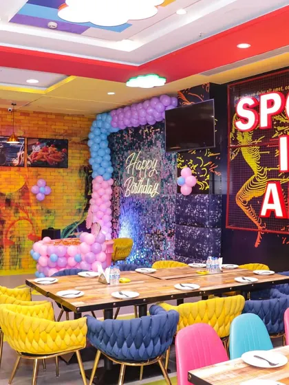 My party area is versatile, with modern decor like this "Sport is Art" wall that can be adapted for any birthday theme.
