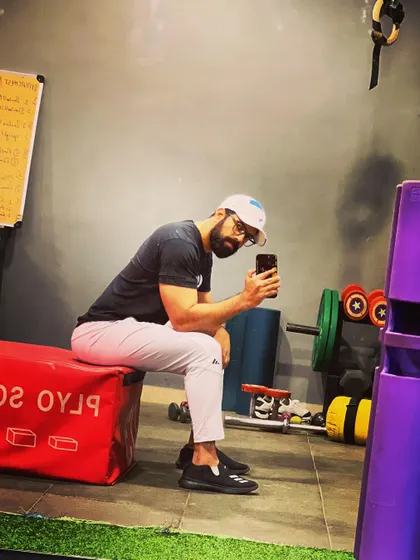 Taking a moment after a great workout. Our facility has all the equipment you need to push your limits, from plyo boxes to a full rack of weights.