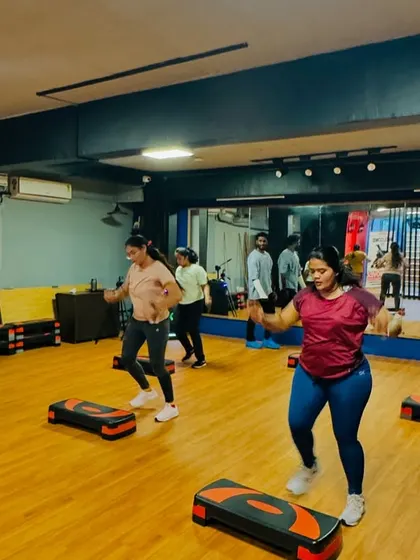 Our members in the middle of a challenging but rewarding step routine. You can see the energy and determination in the room.