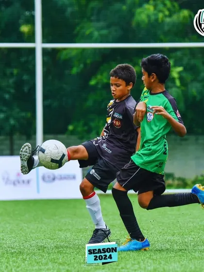 A player showing great ball control under pressure during the MDL Tournament.
