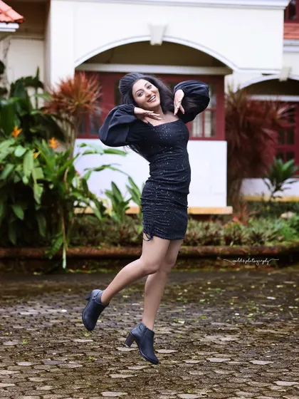 Studio and outdoor portraits of a model in a simple yet elegant black dress. This series focuses on capturing genuine expressions and personality, from joyful laughter to quiet contemplation.