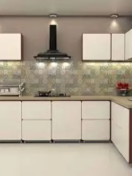 A contemporary L-shaped kitchen with a striking combination of deep red and white cabinets. The design is clean and minimalist, with integrated handles and under-cabinet lighting.