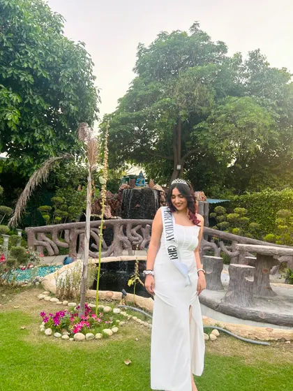 Another beautiful shot from my birthday celebration. The "Birthday Girl" sash adds a fun and personal touch.