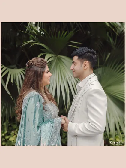 A sweet, candid portrait of Rupen and Shikha, their genuine smiles reflecting their happiness.