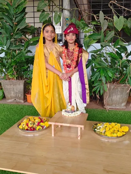 Two of our elementary students pose beautifully in their festive attire for Janmashtami. They take pride in participating and sharing their culture with their peers.