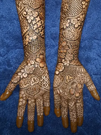 A detailed shot of the palm designs, where you can see the fine lines and shading.