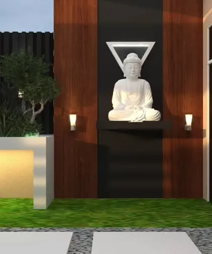 A modern zen corner concept. The design places a Buddha statue in a niche with a geometric background, creating a striking and contemplative feature.