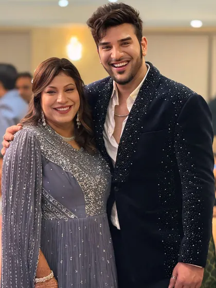 Another photo of Paras Chhabra at an event, showcasing how the embellished blazer looks in a real-world setting. It's designed to be comfortable yet make a statement.