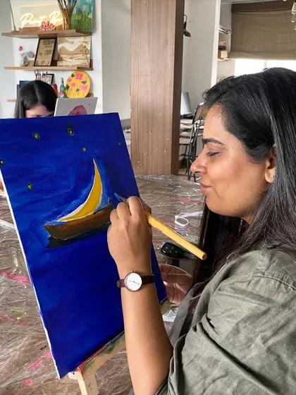 A guest painting at a weekday workshop at Toast & Tonic. It's the perfect way to break up the week and do something creative.