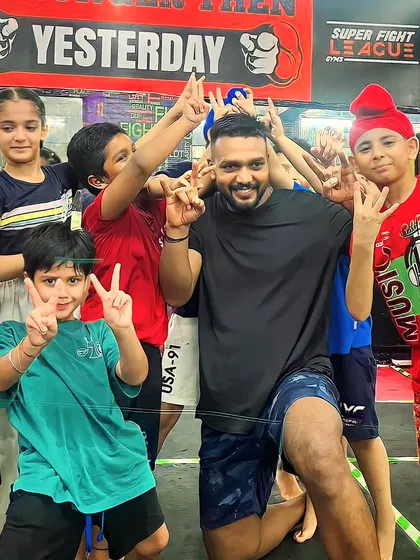 A happy birthday group photo with all the kids. We are more than a gym, we are a family.