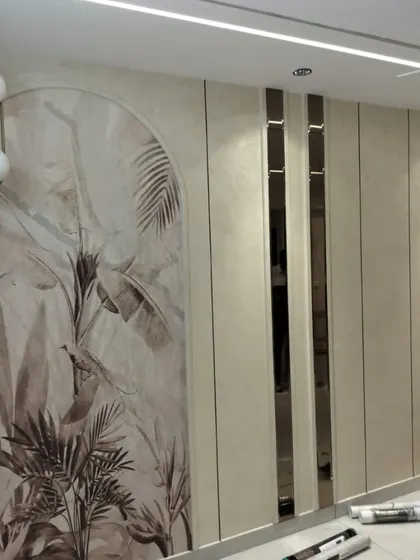 A sepia-toned tropical mural installed within a framed arch, blending classic elegance with natural beauty.