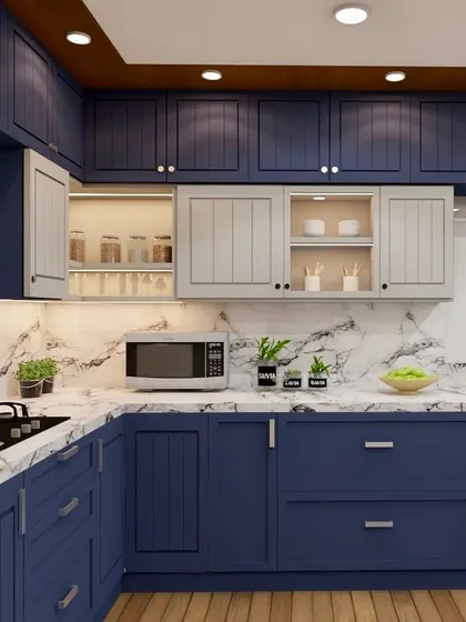 A detailed view of the kitchen's cooking area, with illuminated display cabinets and a sleek microwave placement.