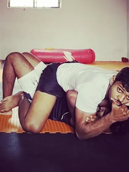 This is a shot from one of my own no-gi BJJ training sessions. I am always a student of the art, constantly refining the same techniques I pass on to my students.