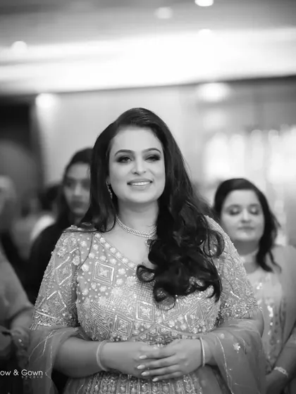 A classic black and white portrait of the bride-to-be. Her direct, happy gaze and the clean composition make this a timeless and elegant photograph.