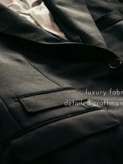 A close-up on the pocket and lapel of a suit, highlighting the luxury fabric and detailed craftsmanship. These are the elements that make a garment feel both comfortable and sophisticated.