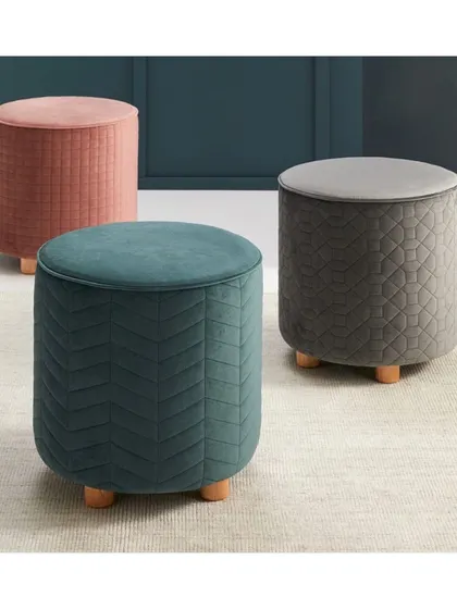 This 'Roux' luxe plush knit fabric is quilted and heavenly to touch. I use such textured fabrics for ottomans and accent seating to add a layer of comfort and visual interest to a room.
