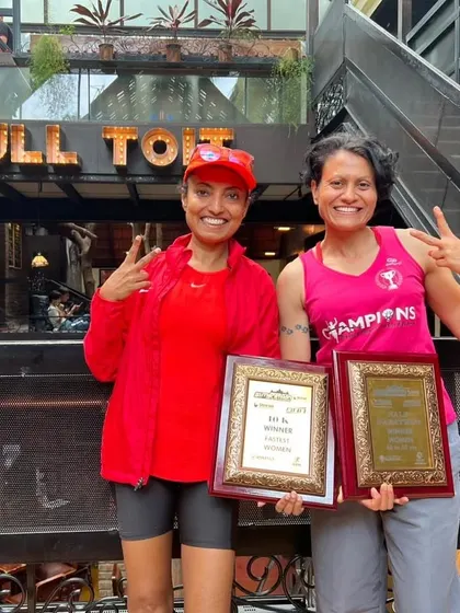 Celebrating a double podium win after the Bengaluru Marathon. I took first in my half marathon age category, and my teammate Anuradha won the 10K. This is a testament to our hard work and consistent training.