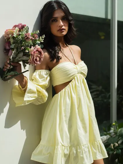 A confident and beautiful shot from the It Girl summer collection, with the model looking directly at the camera.