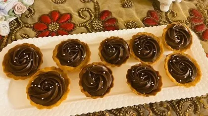My Choco-Caramel Tarts are made with a perfect tart shell, a layer of caramel, and a rich chocolate topping.