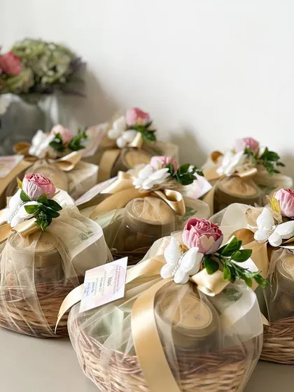 Sweet treats to celebrate the arrival of your little one. These beautifully wrapped baskets were part of a custom order for a baby announcement.