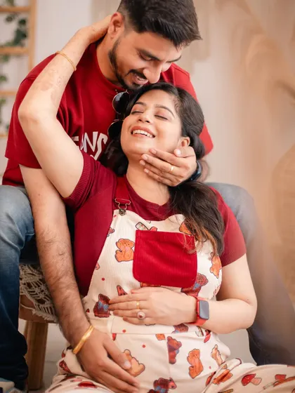 A joyful and candid moment of laughter, captured in our bright and airy boho studio.