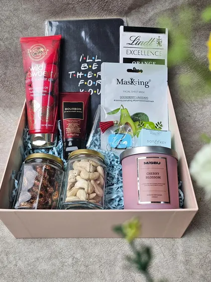 Because every friend is important. Treat your bestie to this personalized hamper filled with skincare, dry fruits, a scented candle, and a custom "I'll be there for you" notebook.