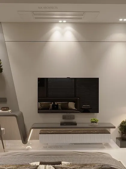 If a bedroom has large windows instead of a traditional wall, we embrace it. This design uses the window as a backdrop, with a floating study desk and TV unit to create a stunning, airy space that feels connected to the outdoors.
